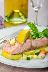 Salon baked in papilota with vegetable