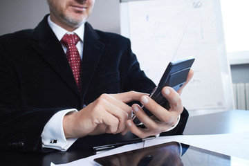 businessman with calculator