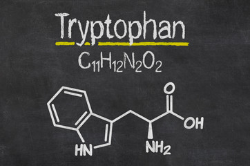 Schiefertafel mit der chemischen Formel von Tryptophan