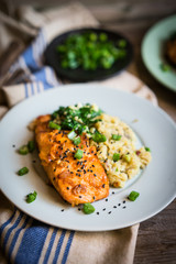 Salmon steak with mashed potatoes and greens