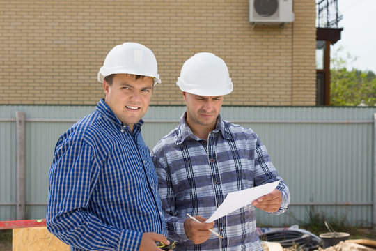 Male Building Engineers Visiting Construction Site