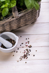 mortar and pestle - herbs and spices, fresh basil and parsley