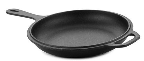 Cast iron cooking pan isolated on white background.