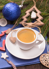 Coffee cup and Christmas decorations