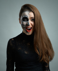 beautiful woman with makeup skeleton dumbfounded