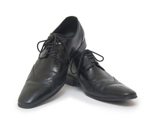Close-up of elegant mens shoes on white background