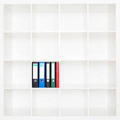 File folders, standing on the shelves at office