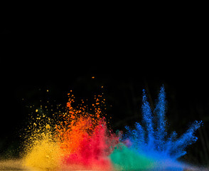 colored dust explosion on black background