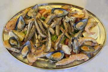 Plate with grilled seafood and fish, Greece