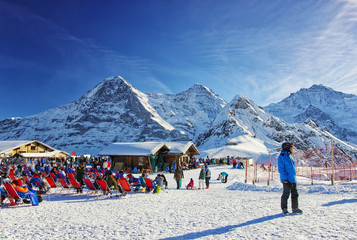Outdoor lounge on winter sport resort in swiss alps highlands, Maennlichen ski resort, Bernese...