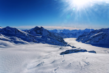 Fototapeta premium Swiss Aletch glacier helicopter view in winter
