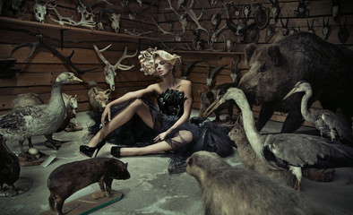 Alluring woman with wild animals