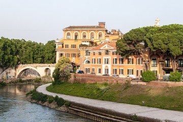 Fototapeta na wymiar Buildings on Isola Tiberina, island in Rome
