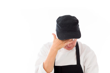 model isolated on plain background ashamed hiding face in hand