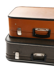 Vintage old travel suitcases, isolated on white