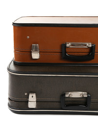 Vintage old travel suitcases, isolated on white