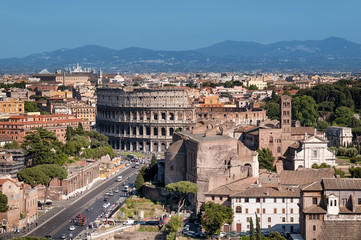Fototapeta na wymiar Ariel view of Colosseum and Roman Forum..