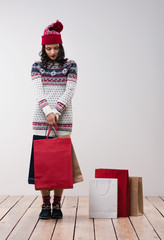Woman shopping for christmas gifts