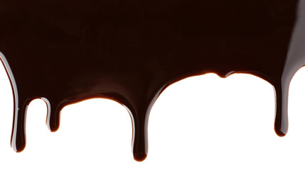 Melted chocolate dripping on white background