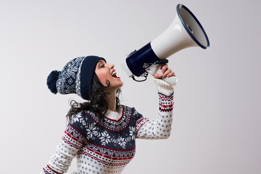 Christmas Woman Shouting With A Megaphone