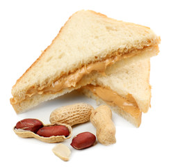 Fototapeta na wymiar Bread slice with creamy peanut butter, isolated on white