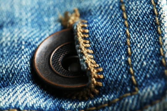 Button on clothes close up