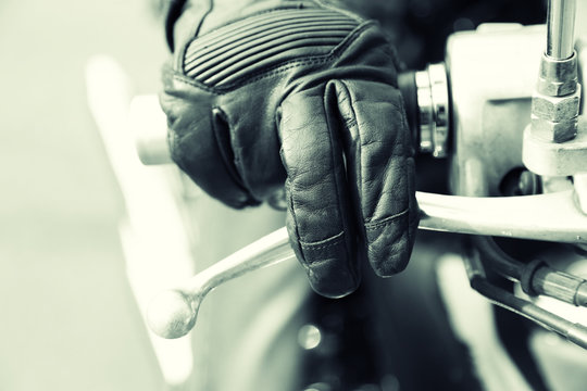 Hand rider on handlebars, close-up