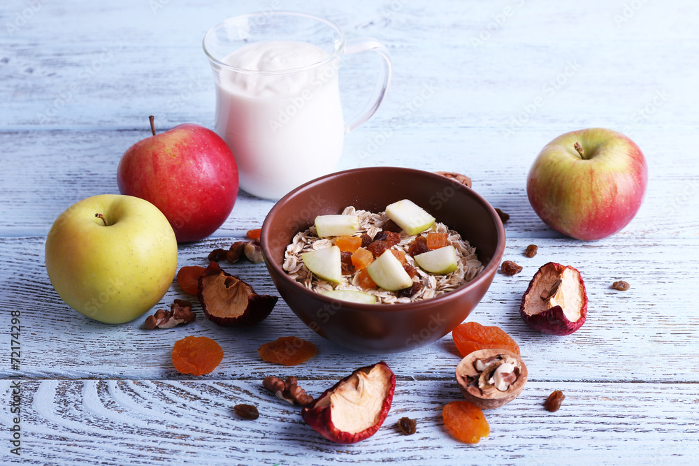 Canvas Prints bowl of oatmeal, walnuts, dried apricots, apples and yogurt