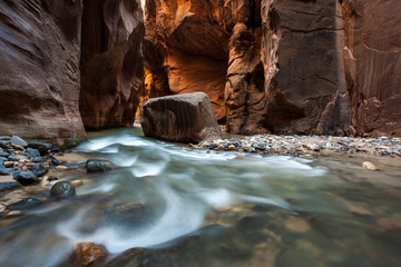 Rock and river flow in The Narrows, Zion National park, Utah