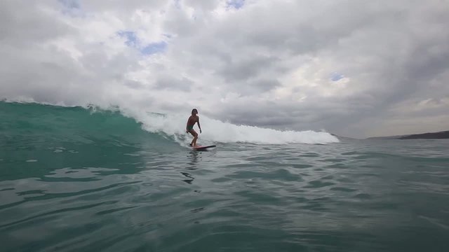 Surfing a wave.View in the water.