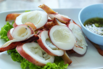 Grilled squid in a dish