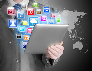 Business man use tablet pc with colorful application icons