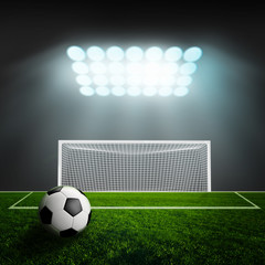 Soccer ball on green stadium arena