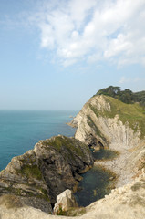 Fototapeta na wymiar Stair Hole rock formation near Lulworth Cove in Dorset