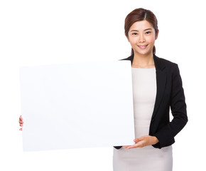 Businesswoman hold with blank board