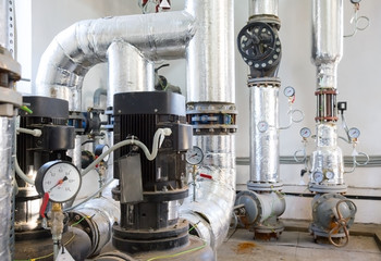 Place in a large industrial boiler room