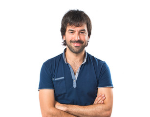 Obraz premium Man with his arms crossed over white background