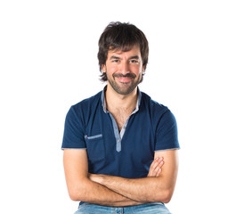 Man with his arms crossed over white background