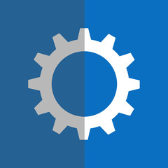 White gearwheel on blue background