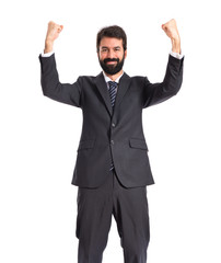 Lucky businessman over isolated white background