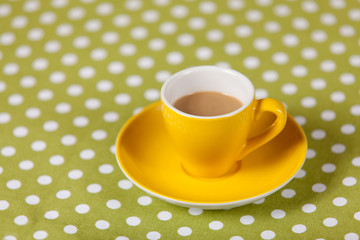 Cup with coffee on a table.