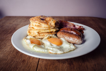 Breakfast with pancakes and bacon