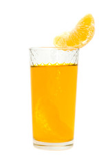 glass of juice with the lobule of orange
