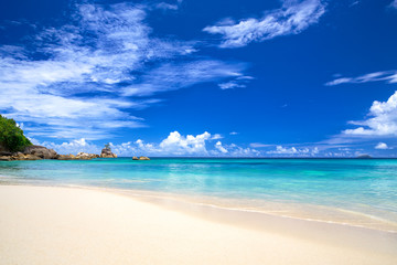 Fototapeta na wymiar Tropical sand beach and blue sky, Mahe Island, Seychelles