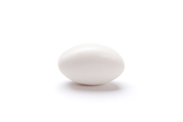 White oval tablet, isolated. Healthcare concept