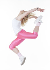 Modern hip-hop style teenage girl jumping