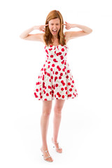 Fototapeta premium model isolated on plain background plugging ears with fingers