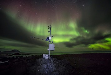Fototapeta na wymiar Remote Automated Weather Station in the Arctic - Northern Lights