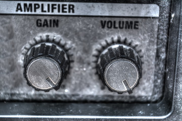 close up of guitar amplifier knobs in hdr