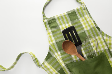 Kitchen apron and utensils